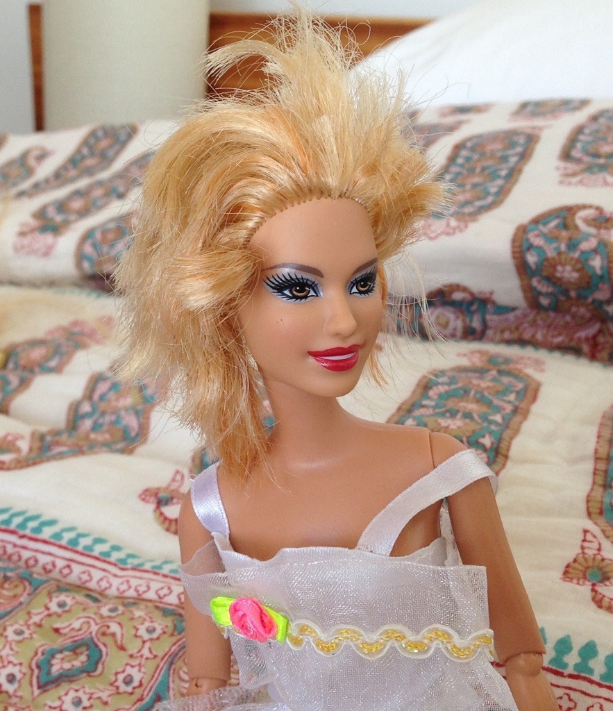barbie with cut hair